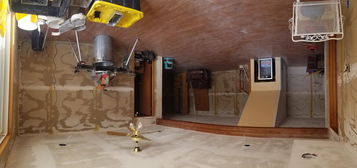 Before pic of the bar room of the basement
